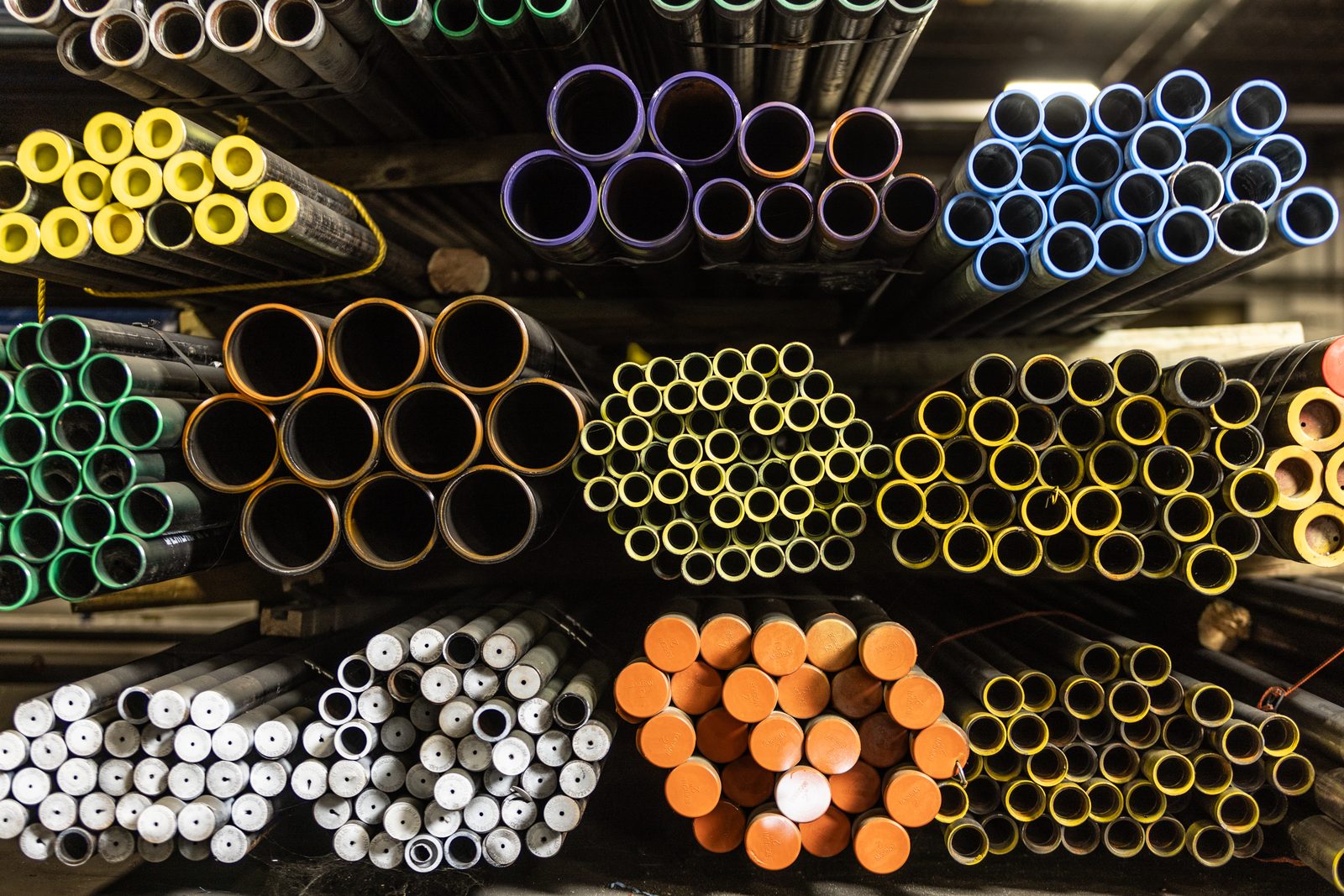 Stacked industrial pipe inventory at MKS